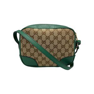 Gucci GG canvas and leather shoulder bag for women